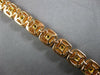 LARGE PINK & INTENSE FANCY YELLOW DIAMOND 18K YELLOW & ROSE GOLD TENNIS BRACELET