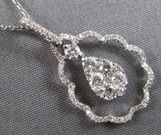 .59CT DIAMOND 18KT WHITE GOLD 3D ROUND CLUSTER FLORAL TEAR DROP FLOATING PENDANT