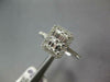 WIDE .83CT DIAMOND 18KT WHITE GOLD ROUND & BAGUETTE RECTANGULAR HALO LOVE RING