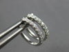 ESTATE SMALL .20CT DIAMOND 14KT WHITE GOLD 3D OVAL HUGGIE HANGING EARRINGS