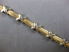 ESTATE 14KT WHITE AND YELLOW GOLD 3D SOLID X LOVE BRACELET