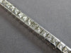 ESTATE 3.99CT DIAMOND 14KT WHITE GOLD CLASSIC PRINCESS CHANNEL TENNIS BRACELET
