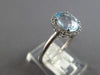 2.12CT DIAMOND & AAA AQUAMARINE 18KT WHITE GOLD 3D OVAL & ROUND ENGAGEMENT RING