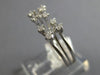 ESTATE .26CT DIAMOND 14KT WHITE GOLD ETOILE DOUBLE FLOWER TENSION FUN LOVE RING