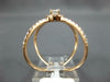 ESTATE LARGE .67CT DIAMOND 14KT ROSE GOLD ROUND HALO CRISS CROSS INFINITY RING