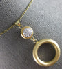 .16CT DIAMOND 14KT YELLOW GOLD 3D MATTE & SHINY CIRCLE OF LIFE FLOATING PENDANT