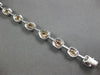 LARGE GIA 6.56CT MULTI COLOR DIAMOND 18KT WHITE & ROSE GOLD HALO TENNIS BRACELET