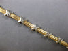 ESTATE 14KT WHITE AND YELLOW GOLD 3D SOLID X LOVE BRACELET