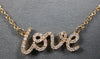 ESTATE .16CT DIAMOND 18KT ROSE GOLD 3D CLASSIC SCRIPT LOVE NECKLACE