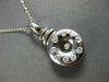 ESTATE .52CT DIAMOND 14KT WHITE GOLD ROUND ETOILE CIRCULAR LOVE FLOATING PENDANT