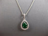 .91CT DIAMOND & AAA EMERALD 18KT WHITE GOLD PEAR SHAPE & ROUND FLOATING PENDANT