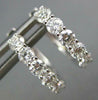 ESTATE .62CT DIAMOND 18K WHITE GOLD CLASSIC 5 STONE SHARED PRONG HUGGIE EARRINGS