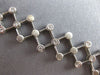 ESTATE .52CT DIAMOND 14K WHITE GOLD BEZEL ETOILE CRISS CROSS FUN TENNIS BRACELET