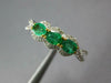 .91CT DIAMOND & AAA EMERALD 18KT 2 TONE GOLD OVAL & ROUND 3 STONE HALO LOVE RING