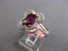 1.83CT DIAMOND & AAA RUBY 18KT WHITE GOLD OVAL & ROUND 4 LEAF CLOVER FLOWER RING