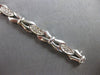 .59CT DIAMOND 14KT WHITE GOLD 3D ROUND 3 STONE XO FILIGREE LOVE TENNIS BRACELET