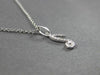 ESTATE .06CT DIAMOND 14KT WHITE GOLD CLASSIC MUSICAL NOTE FUN FLOATING PENDANT