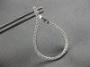 ESTATE LARGE 1.25CT DIAMOND 18KT WHITE GOLD TEAR DROP SIDEWAYS HANGING EARRINGS