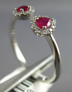 .44CT DIAMOND & AAA RUBY 14KT WHITE GOLD 3D ROUND & PEAR SHAPE TENSION LOVE RING