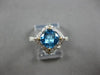1.88CT DIAMOND & AAA BLUE TOPAZ 14K 2 TONE GOLD CUSHION & ROUND GEOMETRICAL RING