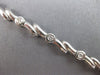 ESTATE .50CT DIAMOND 14K WHITE GOLD BEZEL ETOILE CRISS CROSS FUN TENNIS BRACELET