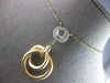LARGE .61CT DIAMOND & AAA LIGHT BLUE TOPAZ 14KT 2 TONE GOLD 3D CIRCULAR NECKLACE