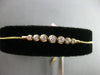 .34CT DIAMOND 14KT YELLOW GOLD 7 STONE GRADUATING BEZEL ADJUSTABLE LOVE BRACELET