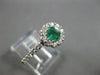 ESTATE .87CT DIAMOND & AAA EMERALD 14KT WHITE GOLD CLASSIC ROUND FLOWER FUN RING