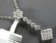 .50CT DIAMOND 14KT WHITE GOLD 3D ROUND & PRINCESS FLOWER LARIAT FLOATING PENDANT