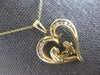 ESTATE .18CT DIAMOND 14KT YELLOW GOLD MOTHER & CHILD HEART LOVE FLOATING PENDANT