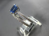 1.51CT DIAMOND & AAA SAPPHIRE 18KT WHITE GOLD BAGUETTE & ROUND ENGAGEMENT RING