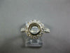 WIDE .55CT DIAMOND 18KT WHITE GOLD BEZEL ROUND HALO SEMI MOUNT ENGAGEMENT RING