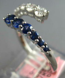 76CT DIAMOND & AAA SAPPHIRE 14KT WHITE GOLD ROUND JOURNEY CRISS CROSS LOVE RING