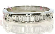 .38CT DIAMOND 18KT WHITE GOLD 3D ROUND & BAGUETTE CHANNEL BEZEL ANNIVERSARY RING