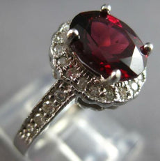 2.10CT DIAMOND & AAA RHODOLITE 14KT WHITE GOLD OVAL & ROUND HALO ENGAGEMENT RING