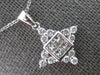 ESTATE .61CT DIAMOND 18KT WHITE GOLD ROUND & PRINCESS SNOWFLAKE FLOATING PENDANT
