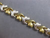 ESTATE WIDE 14KT WHITE & YELLOW GOLD 3D MULTI HEART XO LOVE BRACELET