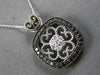 LARGE .55CT WHITE & BLACK DIAMOND 14KT WHITE GOLD HEART SHAPE FLOATING PENDANT