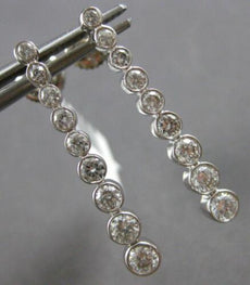 LARGE 1.0CT DIAMOND 14KT WHITE GOLD JOURNEY BEZEL BAR SCREWBACK HANGING EARRINGS