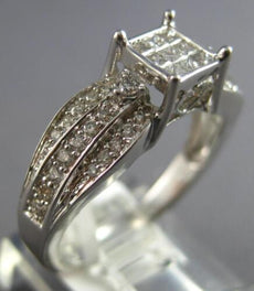.50CT DIAMOND 14KT WHITE GOLD ROUND & PRINCESS SQUARE INVISIBLE ENGAGEMENT RING