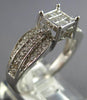 .50CT DIAMOND 14KT WHITE GOLD ROUND & PRINCESS SQUARE INVISIBLE ENGAGEMENT RING