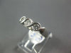 ESTATE .30CT DIAMOND 18KT WHITE GOLD 3D CLASSIC 3 STONE ROUND INFINITY LOVE RING