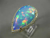 ESTATE EXTRA LARGE 8.13CT DIAMOND & AAA OPAL 14KT YELLOW GOLD CLASSIC HALO RING
