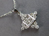 ESTATE .61CT DIAMOND 18KT WHITE GOLD ROUND & PRINCESS SNOWFLAKE FLOATING PENDANT