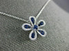 ESTATE .63CT DIAMOND & AAA SAPPHIRE 18KT WHITE GOLD FLOWER FLOATING LOVE PENDANT