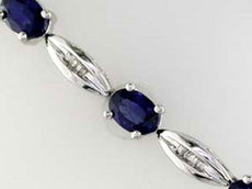 6.90CT DIAMOND & AAA SAPPHIRE 14KT WHITE GOLD 3D OVAL & BAGUETTE TENNIS BRACELET