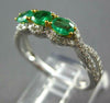.91CT DIAMOND & AAA EMERALD 18KT 2 TONE GOLD OVAL & ROUND 3 STONE HALO LOVE RING