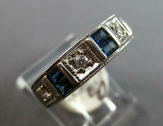 .51CT DIAMOND AND AAA SAPPHIRE 14KT WHITE GOLD ROUND & BAGUETTE ANNIVERSARY RING