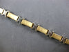 ESTATE 14KT WHITE AND YELLOW GOLD 3D SOLID X LOVE BRACELET