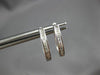 ESTATE .20CT DIAMOND 14KT WHITE GOLD 3D BAGUETTE CHANNEL OVAL HANGING EARRINGS
